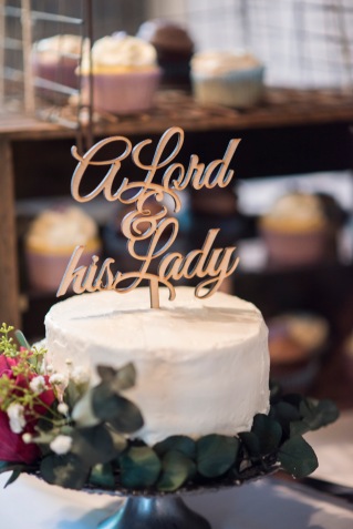 Our beautiful wedding cake with custom cake topper